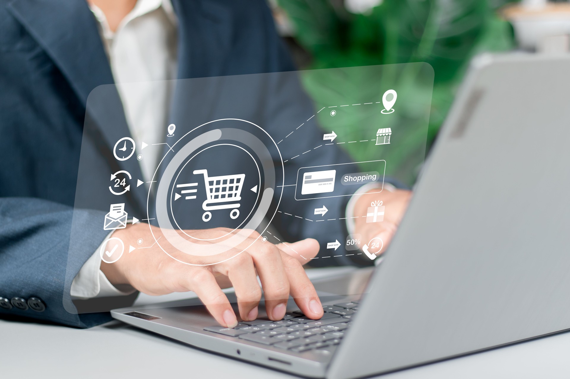 Businessman a laptop with an online shopping cart icon displayed on a virtual screen, representing the concept of ecommerce business, online store and conducting business on the internet